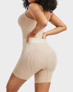 Bellvian beige butt lifting shapewear bodysuit with seamless tummy control and sculpting body contour support, designed for waist slimming, postpartum confidence and invisible smoothing under tight outfits in the UK
