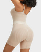 Bellvian beige seamless tummy control body shaper with sculpting waist compression and butt lifting support, designed for invisible body contour smoothing, postpartum recovery and all day shapewear comfort in the UK