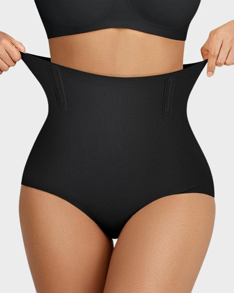 Bellvian black high waist tummy control shapewear panty with seamless body sculpting compression and waist slimming support, designed for stomach flattening, postpartum shaping, invisible contour smoothing and hourglass silhouette enhancement in the UK