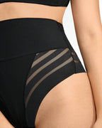 Close up fabric detail of Bellvian black mesh panel high waist shapewear showing seamless tummy control compression material designed for breathable body sculpting, waist slimming and invisible smoothing support