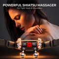 NACRE FORM™ cordless Shiatsu neck and shoulder massager with heat displayed in a premium dark lifestyle advertisement featuring a woman gently holding her shoulder. The black electric neck massager features metallic kneading massage heads, adjustable wearable straps and a central red illuminated panel. This detailed product image highlights the design of a heated neck and shoulder massage device, its Shiatsu-inspired deep kneading technology and hands-free construction for everyday comfort