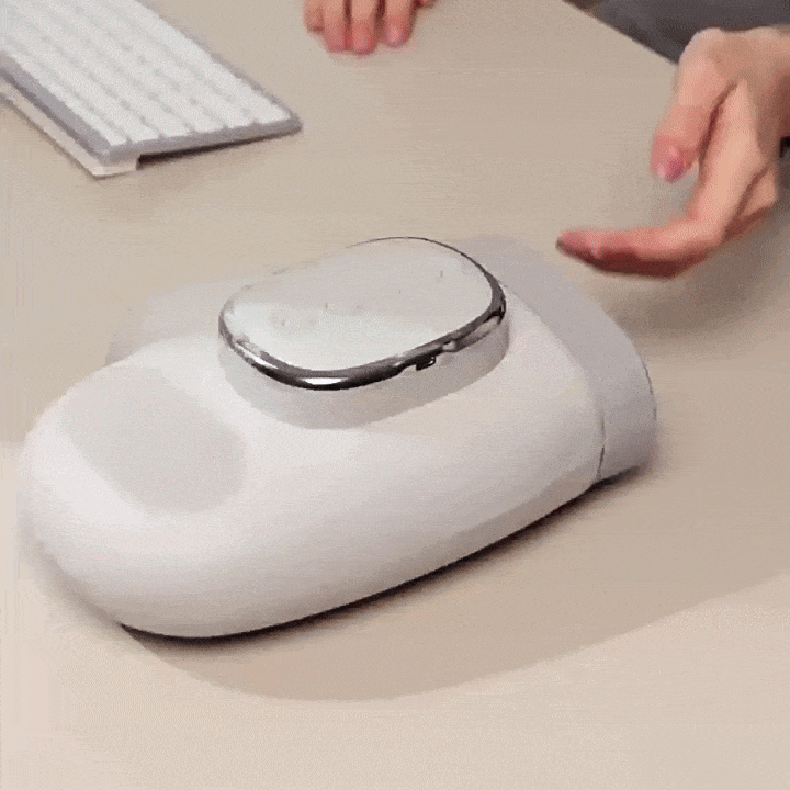 NACRE FORM™ electric hand massager demonstrating soothing heat and rhythmic air compression massage around the fingers and palm, designed to help tired, stiff hands relax after typing, repetitive movements and everyday activities.