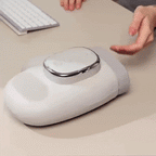 NACRE FORM™ electric hand massager demonstrating soothing heat and rhythmic air compression massage around the fingers and palm, designed to help tired, stiff hands relax after typing, repetitive movements and everyday activities.