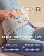 NACRE FORM™ heated lower back massager belt with adjustable lumbar support, featuring 3 heat levels, 3 vibration massage modes, smart controls and automatic shut-off. Woman wearing the rechargeable cordless back heating and massage belt while relaxing at home.
