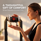 NACRE FORM™ cordless Shiatsu neck and shoulder massager with heat presented as a thoughtful wellness gift for women and men. The premium lifestyle image features a woman holding a black electric neck massager with metallic kneading massage heads, a red illuminated central panel and adjustable padded straps. The elegant warm beige setting highlights the portable rechargeable shoulder massager, its Shiatsu-inspired massage design and its appeal as a practical relaxation gift for mums, dads, partners and loved